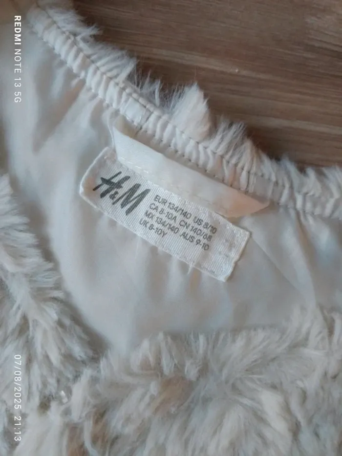 Magnifique gilet fausse fourrure h&M taille 8-10ans - photo numéro 3