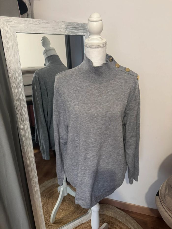 Pull col montant
