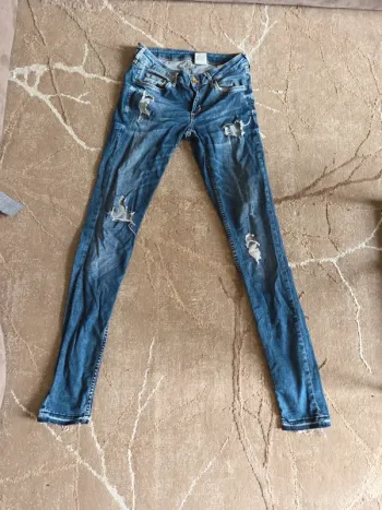 jean femme skinny  troué
