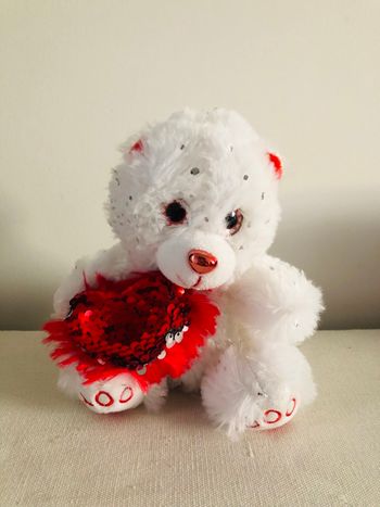 Peluche ours avec coeur sequin réversible