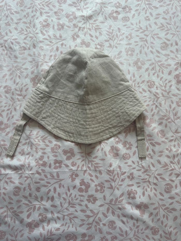 Chapeau neuf de primark taille 3/6mois