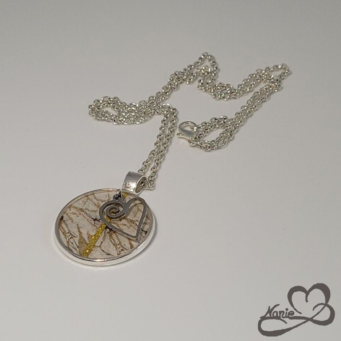 Sautoir argenté et doré avec un cœur