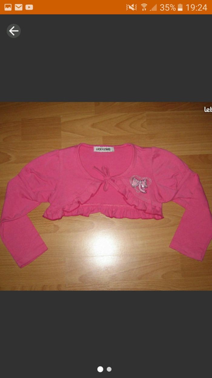 Gilet court boléro rose foncé T 4 ans