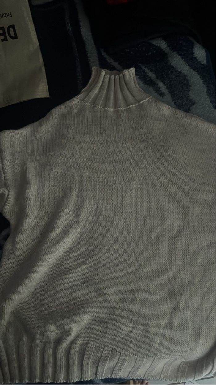 Pull beige col roulé