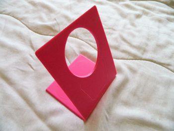 Support de téléphone portable rose comme neuf 