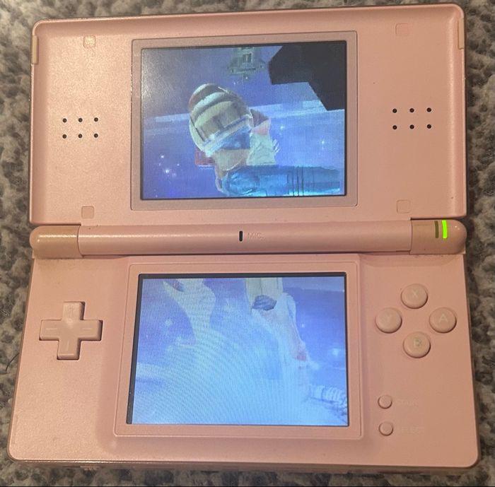Nintendo DS lite rose avec 6 jeux. - photo numéro 3