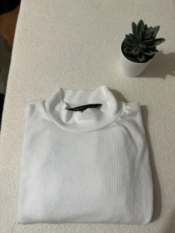 Pull col roulé blanc