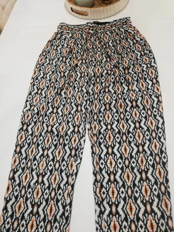 Pantalón fluido bolsillos étnico