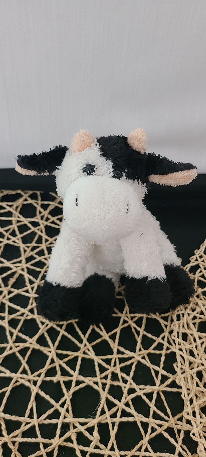 Peluche vache noire et blanche