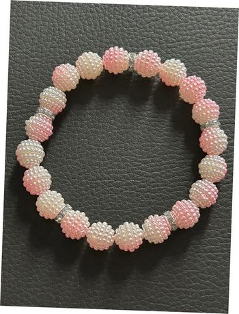 Bracelet rose clair blanc et argenté en perles taille unique jamais porté