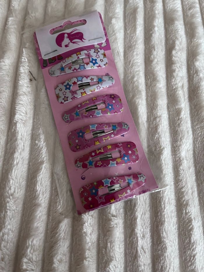 Pinces et élastiques pour cheveux neufs - photo numéro 4