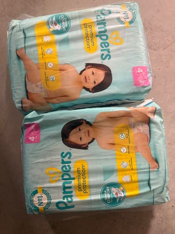 2 pampers premuim taille 4