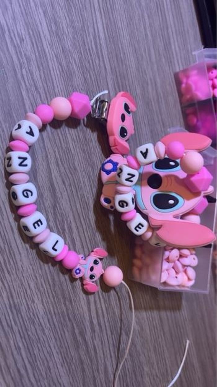 Ensemble attache tétine et anneaux’ de dentition