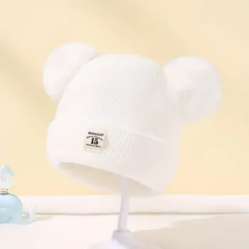 bonnet bebe blanc pompon