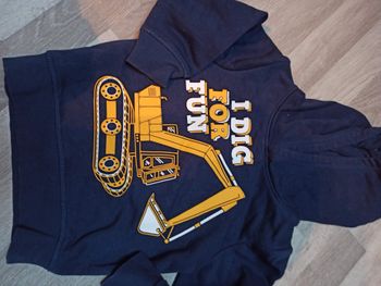 Sweat à capuche pelleteuse