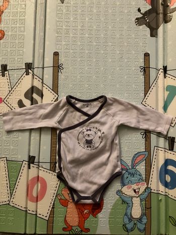 Vend body neuf Kimbaloo taille 6 mois