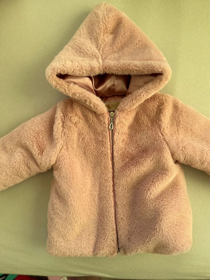 Veste fausse fourrure a capuche