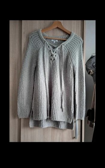  Joli pull couleur gris avec son bel effet argenté