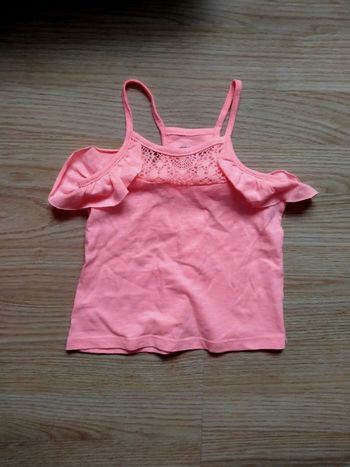 Débardeur orange. Orchestra.
Taille 3 ans