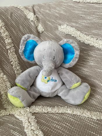 Peluche doudou 20cm Arthur et Lola éléphant bleu et gris fleur verte bon état