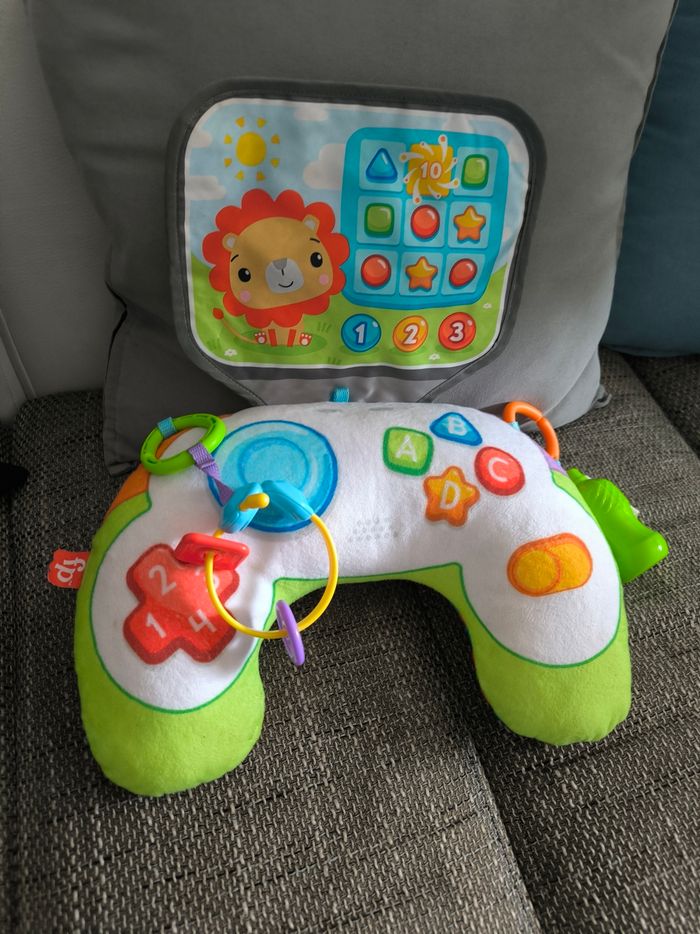 Jouet Fisher Price coussin geek