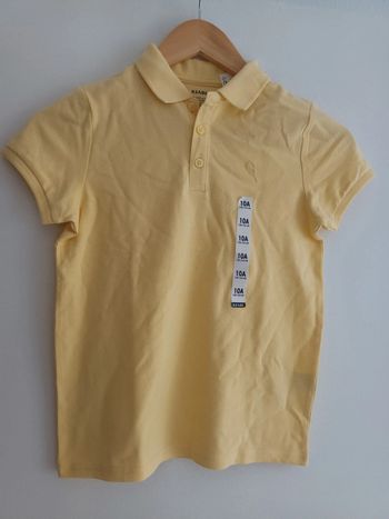 Polo 100 % coton bio jaune banane 10 ans neuf avec étiquette 🏷
