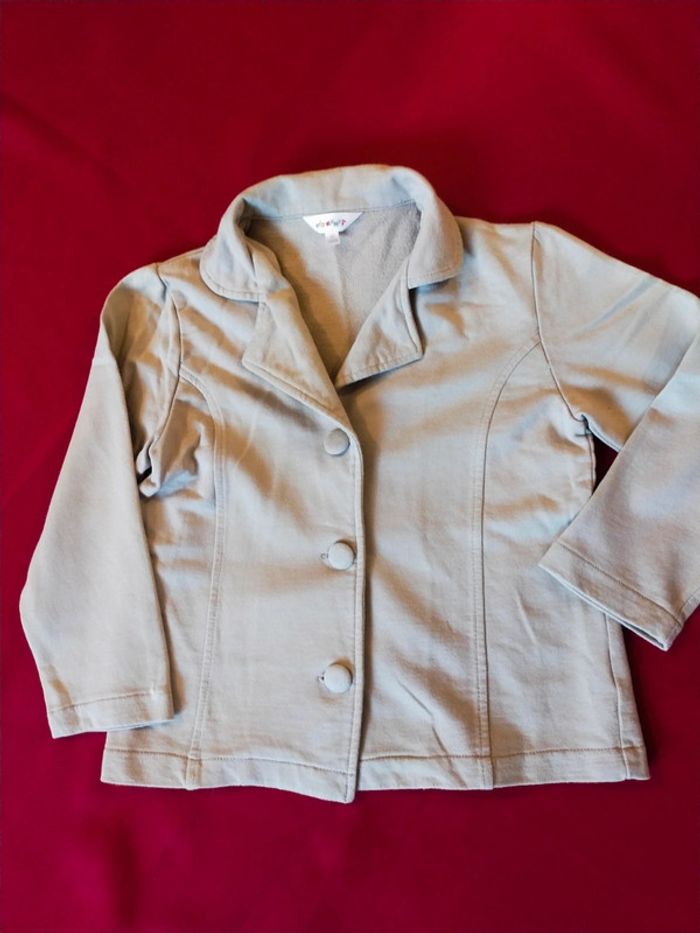 Jolie veste a bouton crème 5 ans