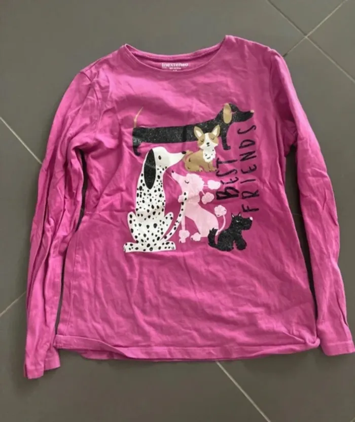 T shirt in extenso 10 ans en très bon état