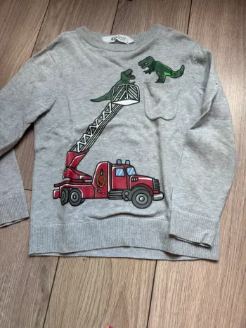 Pull dinosaure pompiers