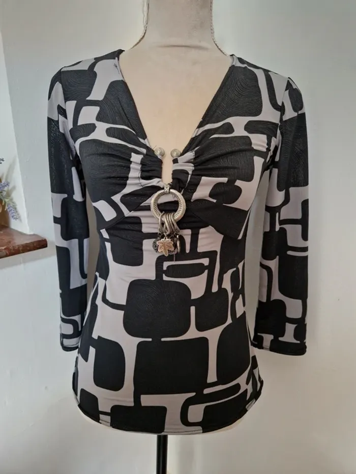 Tres jolie haut bijoux