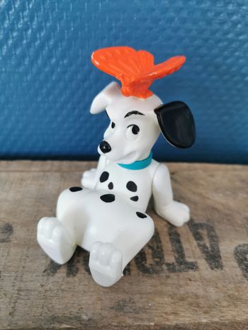 Figurine Dalmatien avec papillon sur la tête