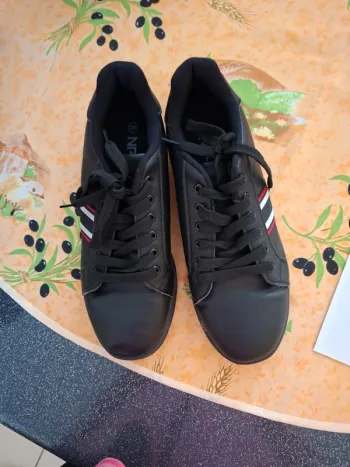 Tennis homme npo 40 peu porté
