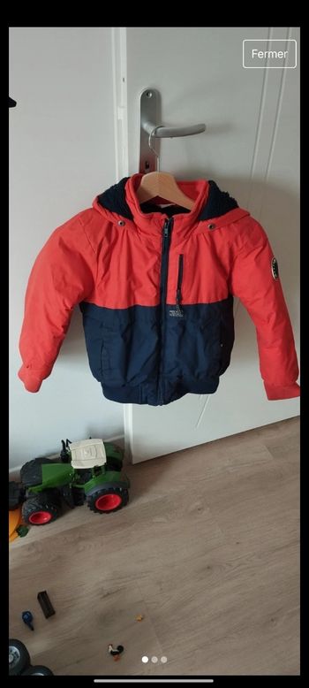 Manteau tape à l'oeil