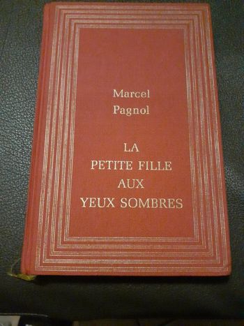 Livre La petite fille aux yeux sombres.M.Pagnol