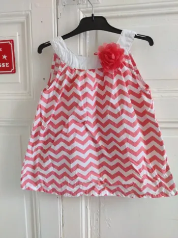 Top avec fleur taille 4 ans