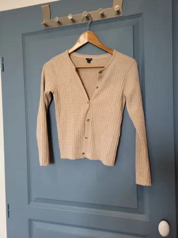 Jolie Veste pailletée beige doré kiabi 10 ans
