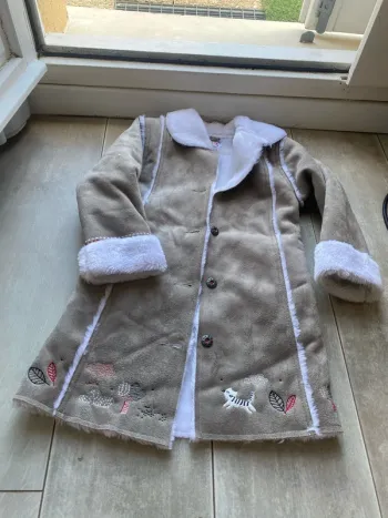 Manteau taille quatre ans