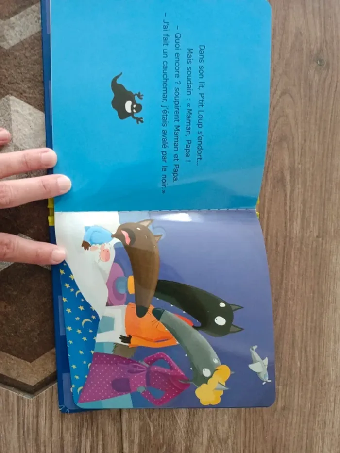 Livre P'tit loup a peur du noir - photo numéro 2