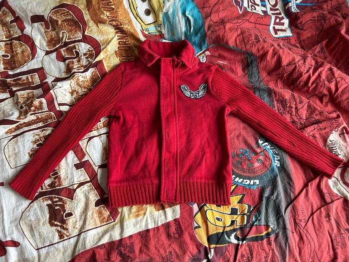 Veste rouge à zip et bouton nky 6 ans
