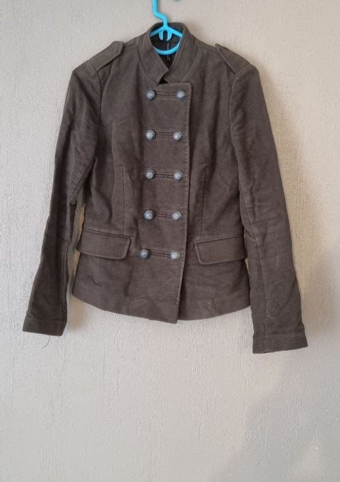 Veste avec boutons