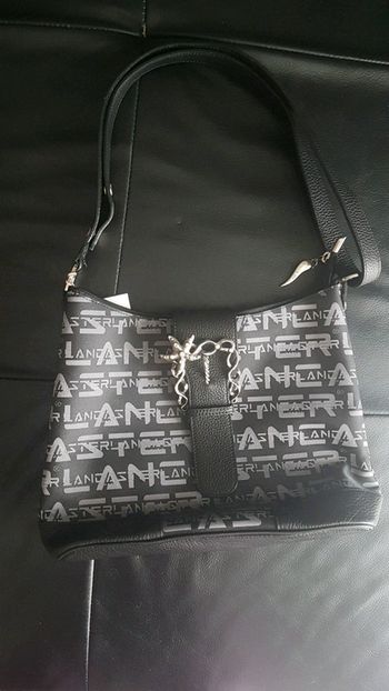 Sac à main lancaster état neuf