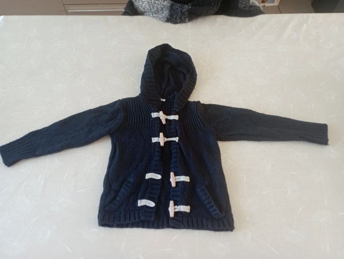 Gilet marine manches longues 5 ans 2€