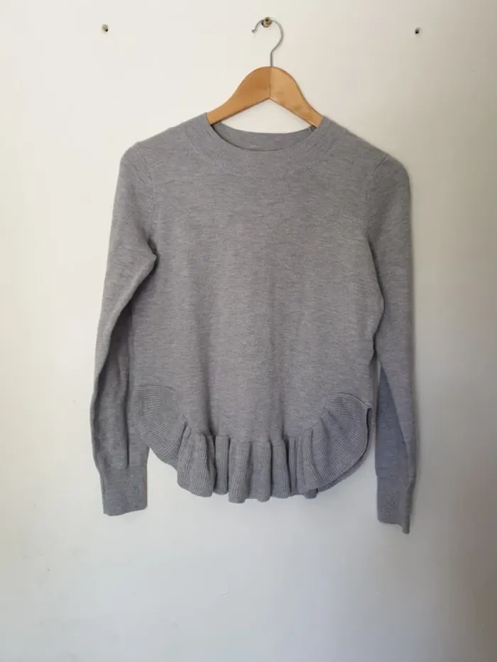 Pull col montant bas peplum A1179