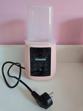 Chauffe biberon neuf 