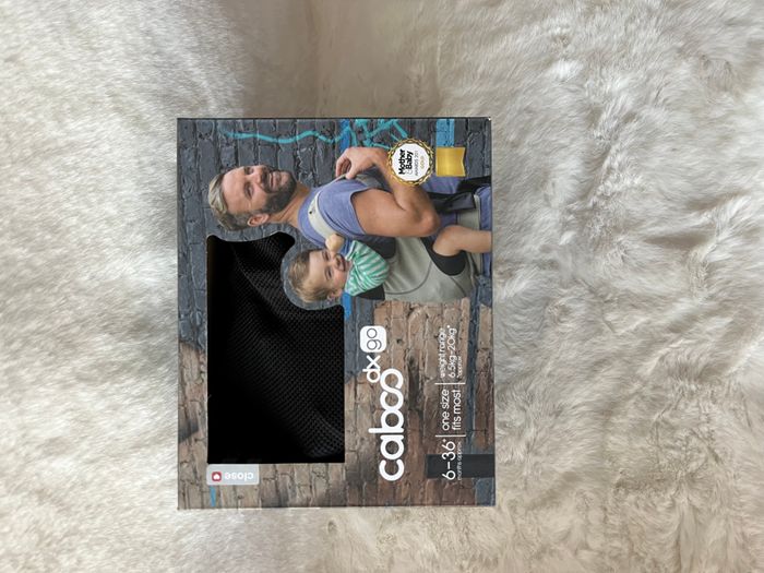 Porte bébé de marque CABOO - modèle dx go - couleur : bleu marine. Poids 6,5 à 20 kilos - photo numéro 4