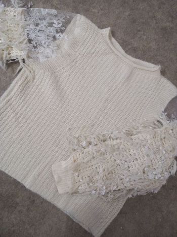 Pulls femme. Prix unitaire