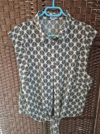 Chemise sympa sans manche taille 48