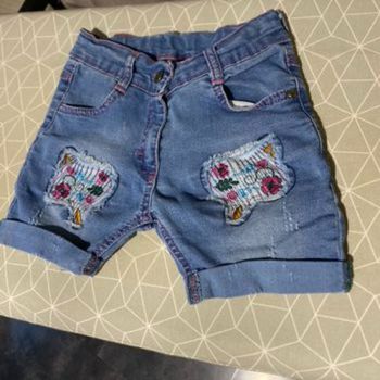 Short fille en jeans fleurs brodées 9 ans