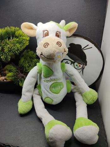 Doudou vache blanc vert fleur bras jambe coulissant vachement tendre cmp peluche