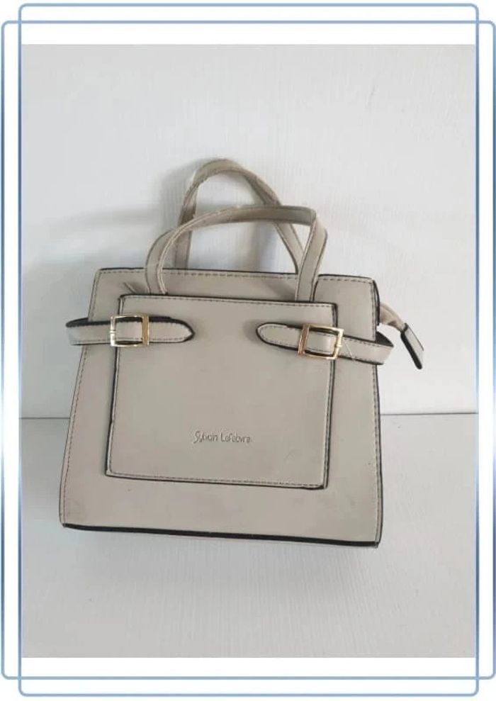 Sac à main Sylvain Lefebvre, plusieurs traces 22x19cm